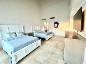 resort style beach front condo on the top floor!
